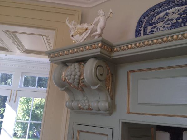 Extra Wide Vine Leaf Corbel, item code PN 680, seen here supporting a homestyle kitchen range mantelpiece with Egg and Dart Moulding, item code PN 522